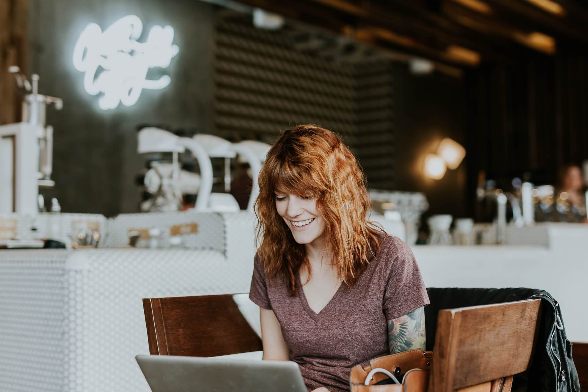 a female no code programmer working alone